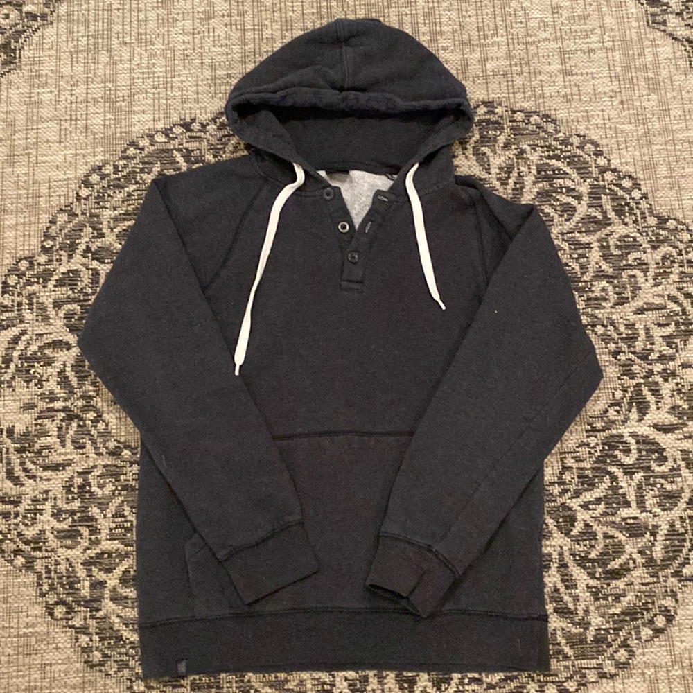 Gray, cotton blend hoodie with three button neckline and front pocket